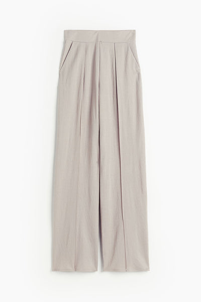 Airy women's trousers with a wide cut and pleats at the waistband 0