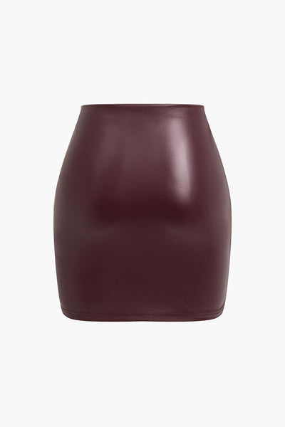 Jocasta | Figure-hugging faux leather mini skirt with side ruching and asymmetrical hem 1