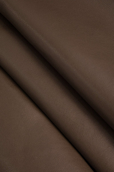 Marigold | Playful faux leather skater skirt with a high-waisted cut and flared hem 8