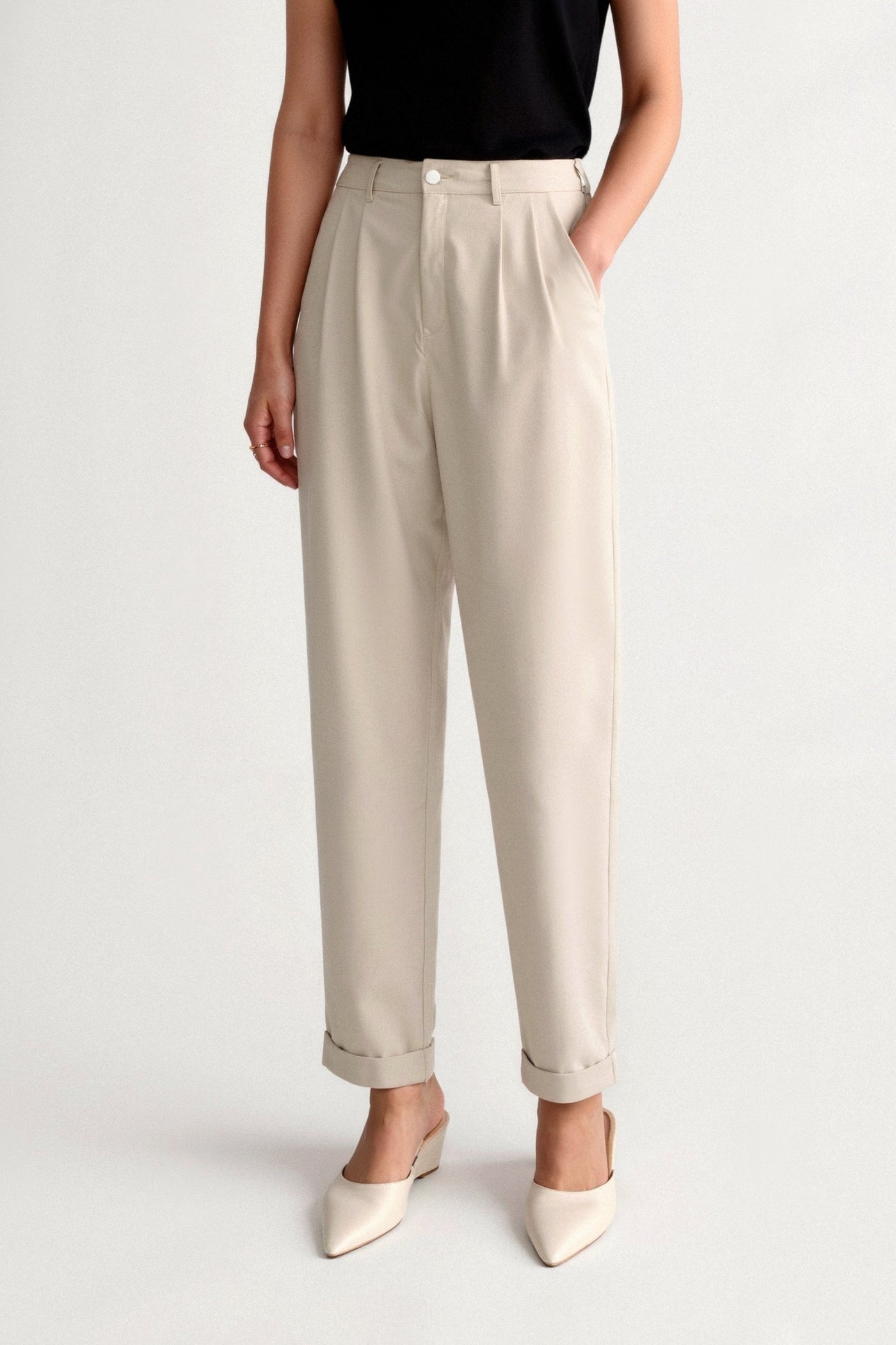 Timeless women's trousers with pleats and turned-up hem 1