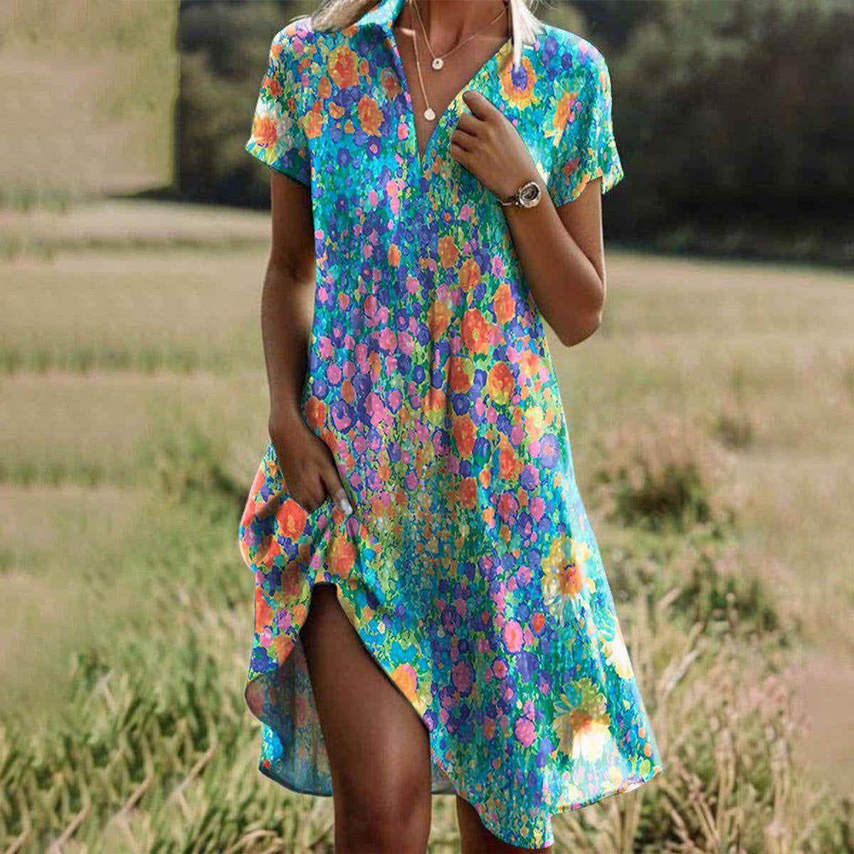 Womens Floral Midi Dress with Short Sleeves and an Asymmetric Hem